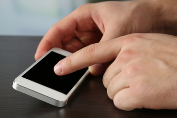 Hands holding smart mobile phone