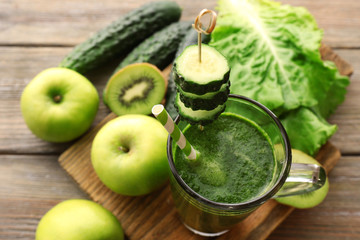 Green fresh healthy juice with fruits and vegetables
