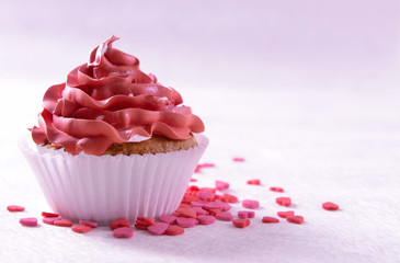 Delicious cupcake on table close-up