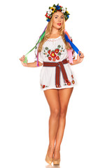 Attractive woman wears Ukrainian national dress isolated