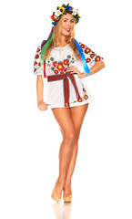 Attractive woman wears Ukrainian national dress isolated