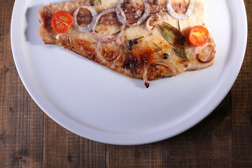Dish of Pangasius fillet with spices and vegetables