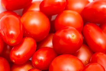 Red Cherry Tomatoes Group For Sale In Vegetable Market