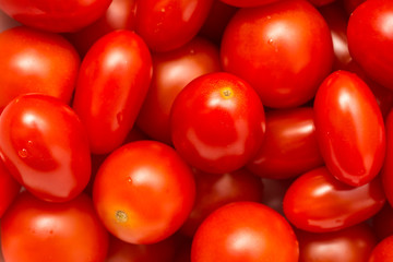 Red Cherry Tomatoes Group For Sale In Vegetable Market