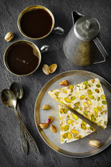 eastern traditional Pistachios dessert on gray background