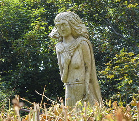 Wood carving overlooking Saint Marys Bay Torbay Devon