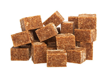 Brown sugar cubes on a white background