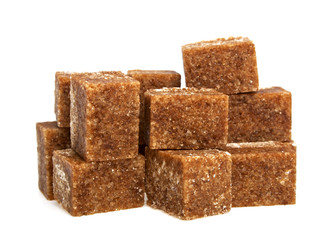 Brown sugar cubes on a white background