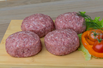 Raw burger cutlet