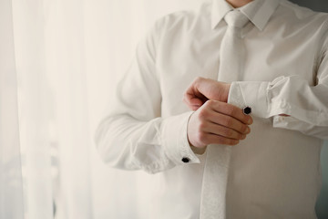 men wear a shirt and cufflinks