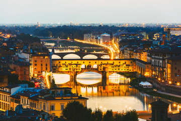 Fototapeta na wymiar Arno River and bridges Ponte Vecchio