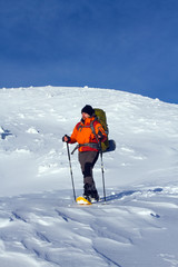 Winter hiking in snowshoes.