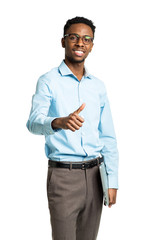 Happy african american college student standing with laptop and