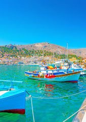 Fototapeta na wymiar fishing boats at the main port of Kalymnos island in Greece
