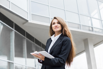 Successful businesswoman using a digital tablet computer