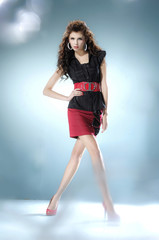 Naklejka premium Full length fashion or casual girl posing on light background