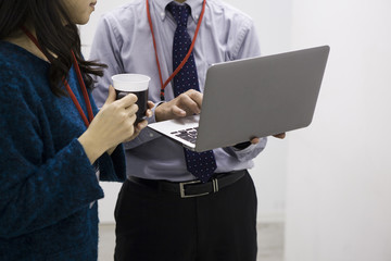 Businessman is showing a laptop