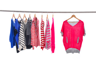 Set of female colorful clothes on Hangers