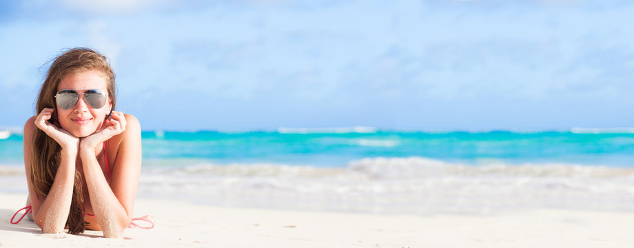 Long Haired Girl In Bikini On Tropical Caribbean Beach