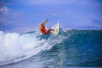 Surfer on Amazing Blue Wave