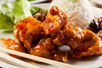 Fried chicken pieces with sweet and sour sauce
