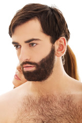 Obraz premium Woman with her head on man's back.