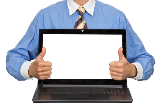 Geschäftsmann präsentiert Laptop mit Textfreiraum