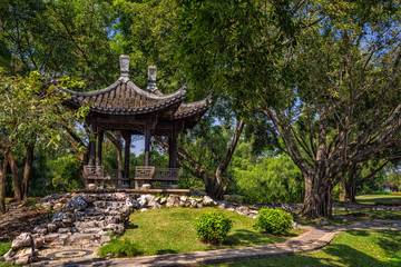 Chinese classical garden with pavilions and pond