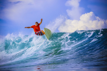 Surfer on Amazing Blue Wave