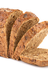 Slices of brown bread on a wooden table