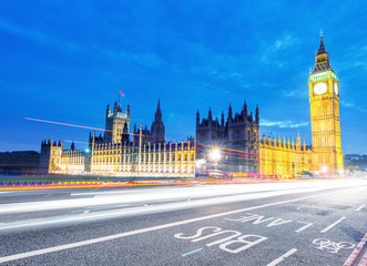 Fototapeta na wymiar Car light trails under Houses of Parliament, London