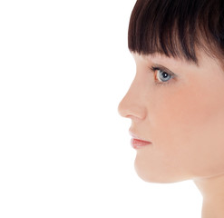 Profile of pretty woman face over white