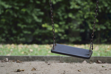 Damage metal playground swing
