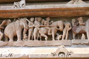 Fototapeta na wymiar Khajuraho temples and their erotic sculptures, India