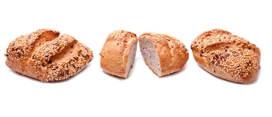 Fresh whole grain bread cut in half on white background