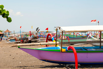 Typical indoneisan boats called jukung on the beach of Lovina, B
