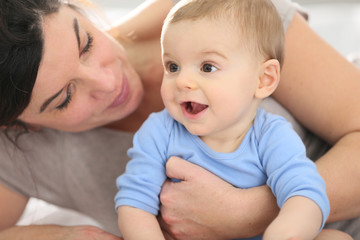 Portrait of happy mother with baby boy