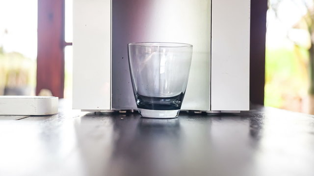 A Glass of Filtered Water from a Filtration Machine