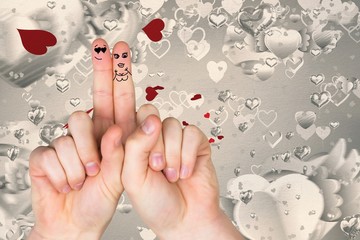 Composite image of fingers crossed like a couple