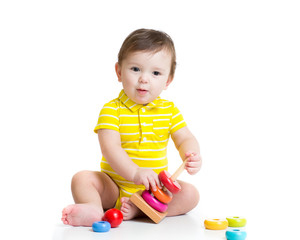 baby boy playing with colorful toy