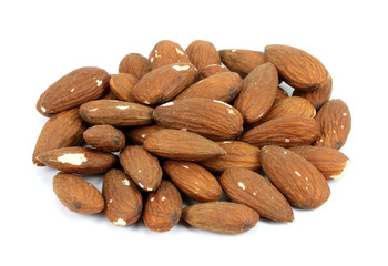 Heap of almond nuts isolated on white background