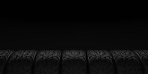 Car tires on black background © artegorov3@gmail