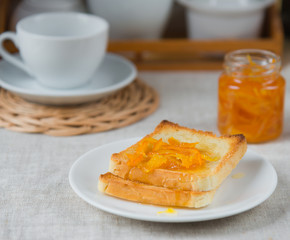 Toast with home-made orange marmalade, served with a cup of tea