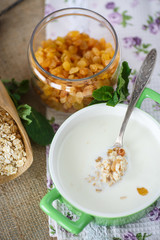oatmeal with milk and raisins