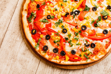 pizza on the wood background