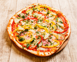 pizza on the wood background