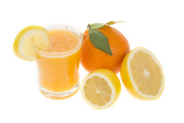 Juice in glass with citrus fresh fruits