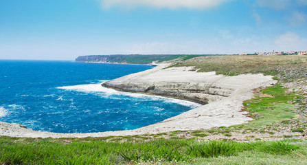 Sardinia shoreline under a blue sky