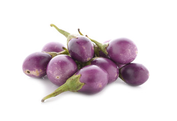 fresh purple eggplants on white background