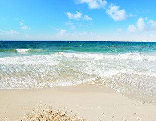 Poetto beach under a blue sky